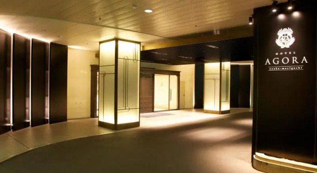 Кровать в общем номере Hotel Agora Osaka Moriguchi