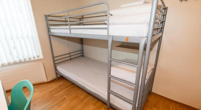 Кровать в общем номере Akureyri Hostel
