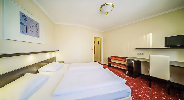 Двухместный номер Standard PLAZA INN Rieker Stuttgart Hauptbahnhof
