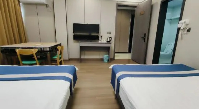 Кровать в общем номере Lushan  yinghua  Hotel