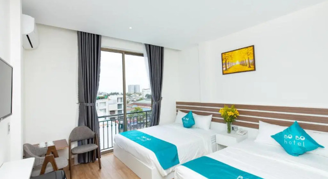 Семейный номер Deluxe с балконом BOBO Boutique Hotel