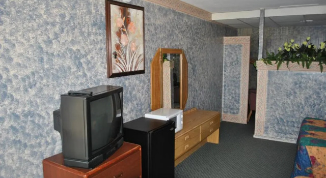 Четырёхместный номер Standard Travel Inn Motel