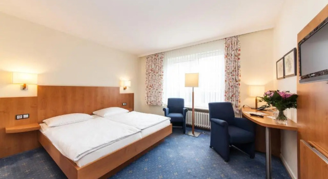 Трёхместный номер Standard Hotel Drei Kronen Elmshorn