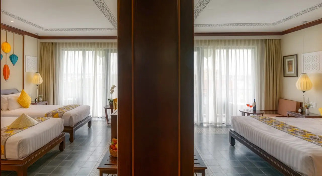 Люкс семейный Savvy с балконом и с видом на реку Cozy Savvy Hoi An - The Quintessence of Exquisite Retreat