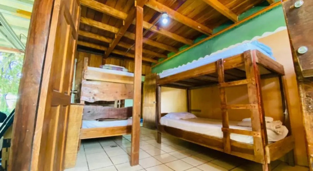 Кровать в общем номере Hostel La Suerte