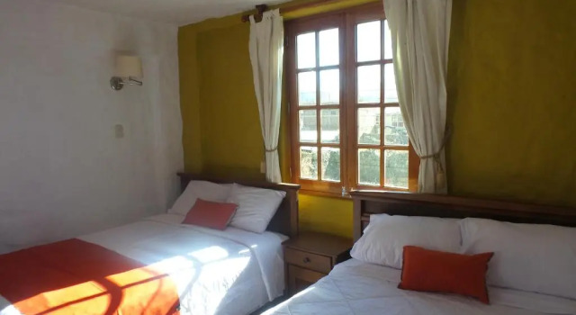 Четырёхместный номер Deluxe La Casa de Santiago Hotel