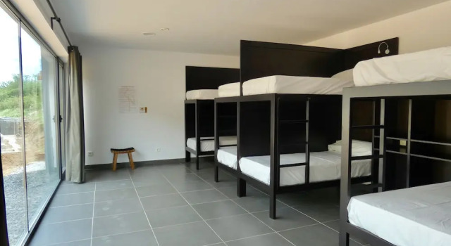 Кровать в общем номере Hotel Casa Sueño