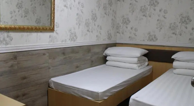 Кровать в общем номере (мужской номер) Golden Island Hotel