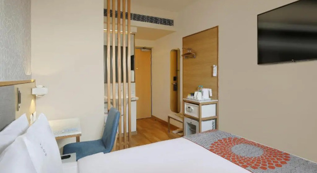Кровать в общем номере Holiday Inn Express Pune Pimpri by IHG