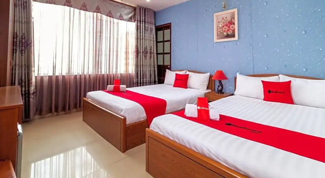Номер Deluxe RedDoorz Nam Bac Hotel Phan Dang Luu Phu Nhuan