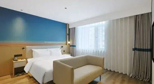 Люкс Deluxe Ni Hao Hotel (Huadian Dajie)