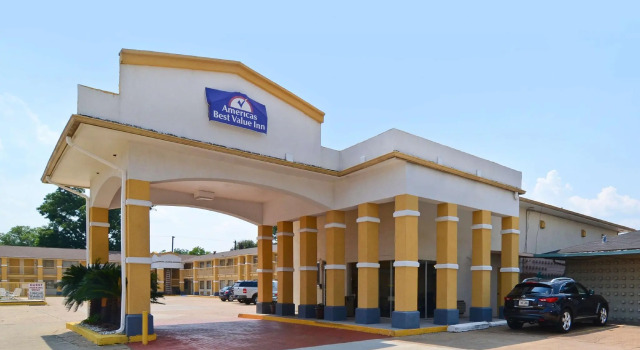 Кровать в общем номере Americas Best Value Inn Alexandria