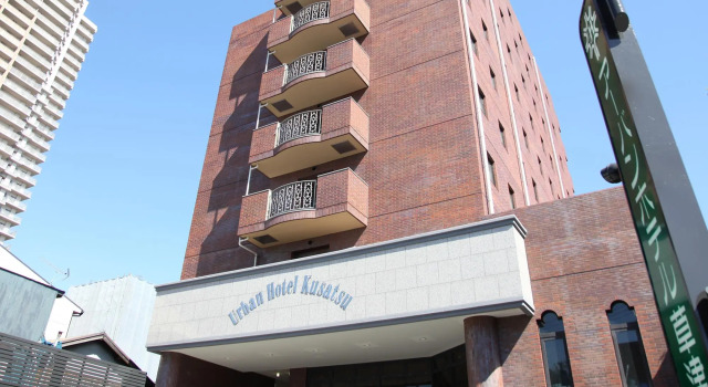 Кровать в общем номере Urban Hotel Kusatsu