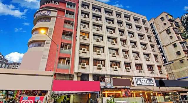Кровать в общем номере Hotel Mina International