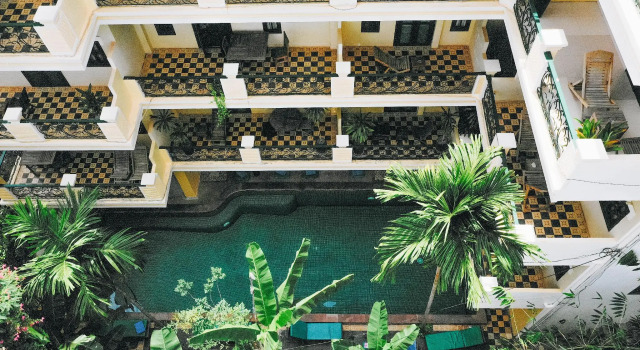 Кровать в общем номере Golden Banana Residence