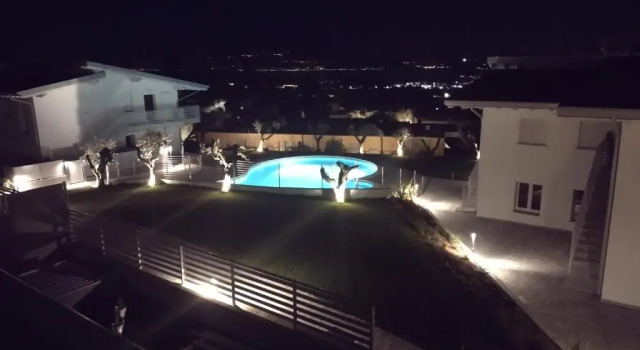 Апартаменты Bilocale in residence vista lago con piscina