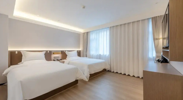 Номер Comfort Huanyi Hotel