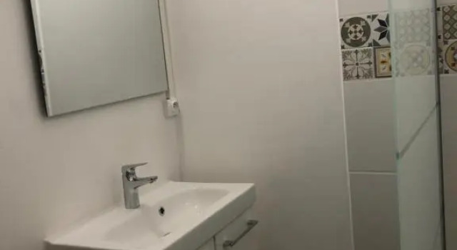 Кровать в общем номере La Promenade House
