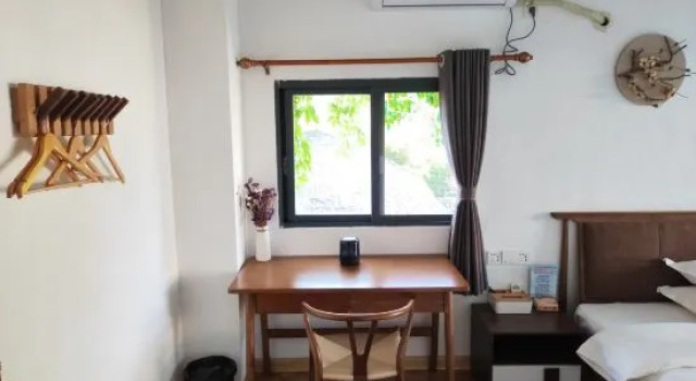 Кровать в общем номере Zhaoping Huangyao Town Poya Inn