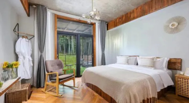 Кровать в общем номере Deqing, Mogan Mountain, Mo see Rainbow Homestay