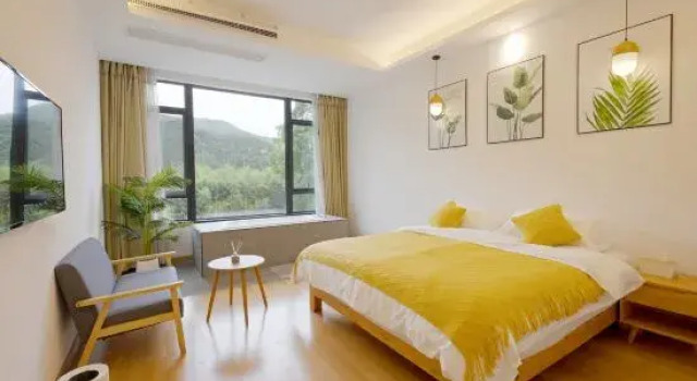 Кровать в общем номере Moganshan Zhuji Mountain Lodge