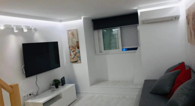 Cozy Apartment Malasaña FREE Parking, Boek Appartement Madrid Community of Madrid, in de buurt van Edificio Grassy