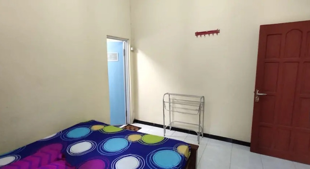Cama en dormitorio compartido Homestay Pratiwi