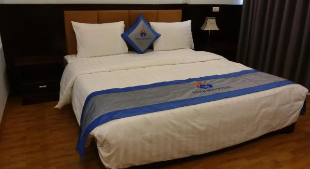 Одноместный номер Deluxe с балконом Minh Sơn HOTEL