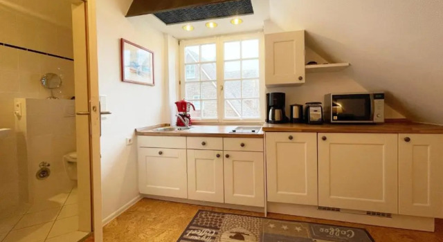 Апартаменты Ferienwohnung unter Reet 2