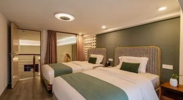 Люкс с 3 комнатами Pafei Apartment (Guangzhou Luogang Xiangxue Metro Station)