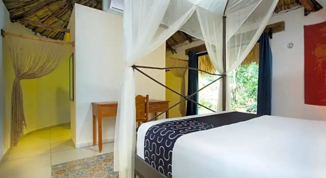 Полулюкс Capital O Hotel Hacienda Yunku