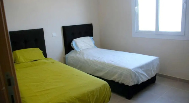 Apartment with 2 Bedrooms in Bouznika, with Wonderful City View, Pool Access And Furnished Terrace - 4 Km From the Beach, Rezervasyon Daire Doukkala-Abda otoparklı oteller, Otopark