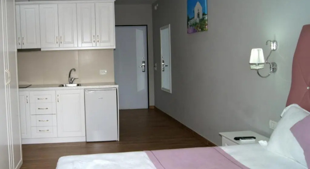 Трёхместный номер Standard с балконом Apartments Flower Residence