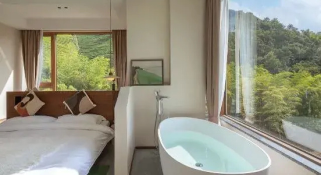 Кровать в общем номере Huzhou Miaoxi Boutique B&B