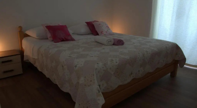 Апартаменты с 2 комнатами с балконом и с видом на море Apartments Rogulj