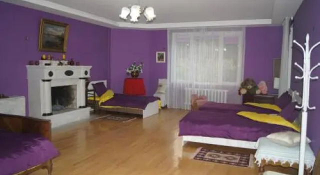 peaceful yellow hostel with garden