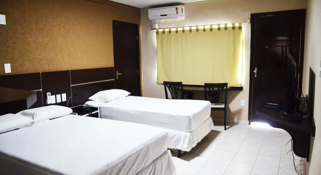 Номер Deluxe Pinheiro Palace Hotel