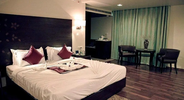 Кровать в общем номере Best Western Plus Ramachandra