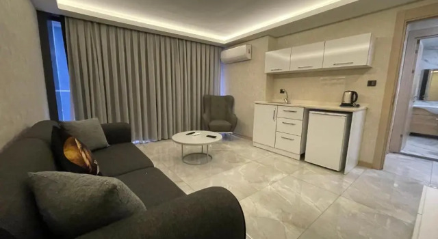 Апартаменты c 1 комнатой Le Luxe Suites Hotel