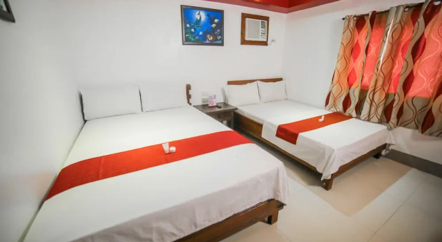 Standardowy czteroosobowy pokój Bataan White Corals Beach Resort