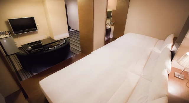 Номер Deluxe Kaishen Sinsu Hotel