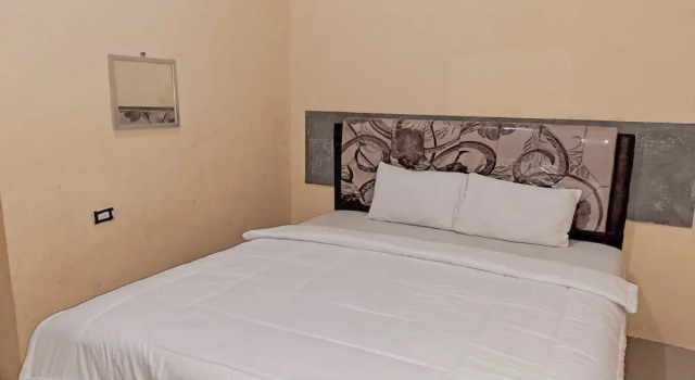 Номер Standard OYO Life 93590 Penginapan Palapa 10 Syariah