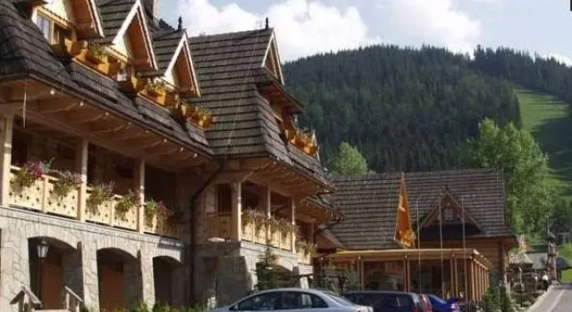Кровать в общем номере Hotel Nosalowy Dwór