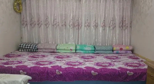 Кровать в общем номере Panjin Shengxue Farm Stay