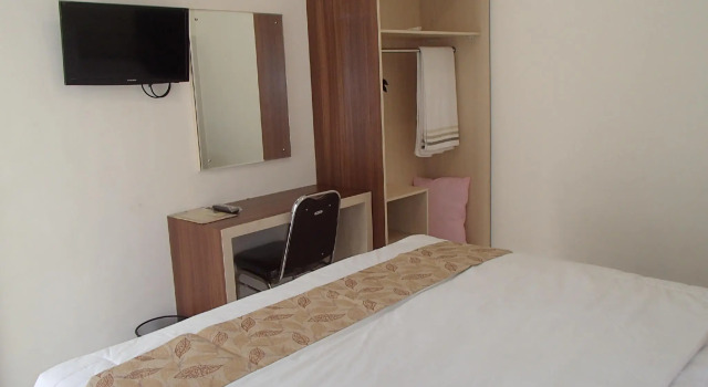 Luxo quarto Shakila Guest House
