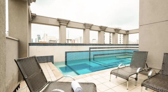 Кровать в общем номере Novotel SP Jardins