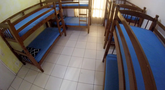 Кровать в общем номере Hostel do Bosque