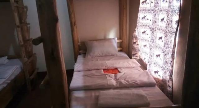 Кровать в общем номере Rafiki Lodge Sipi