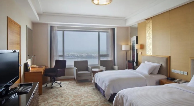 Crowne Plaza Hotel Dandong, Buchen Sie Hotel Zhenxing Dandong