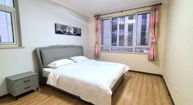 Семейный люкс Deluxe Tianjin Manju Seaview Projection Apartment (Haiboguan Branch)